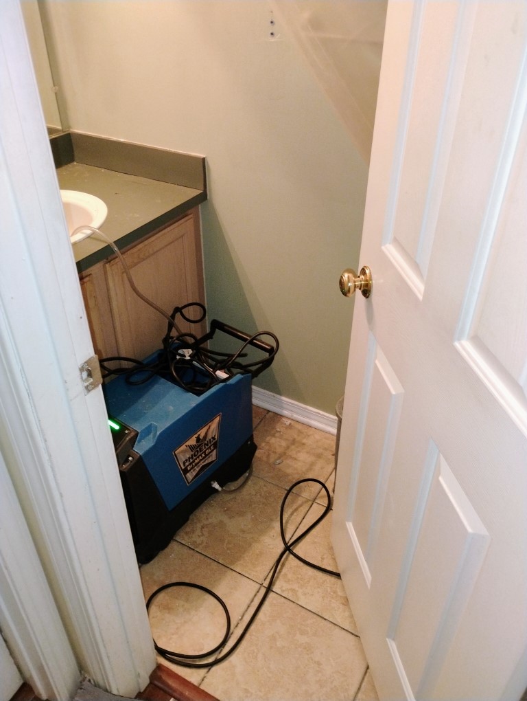 Bathroom water damage cleanup and repair preparation in Ypsilanti