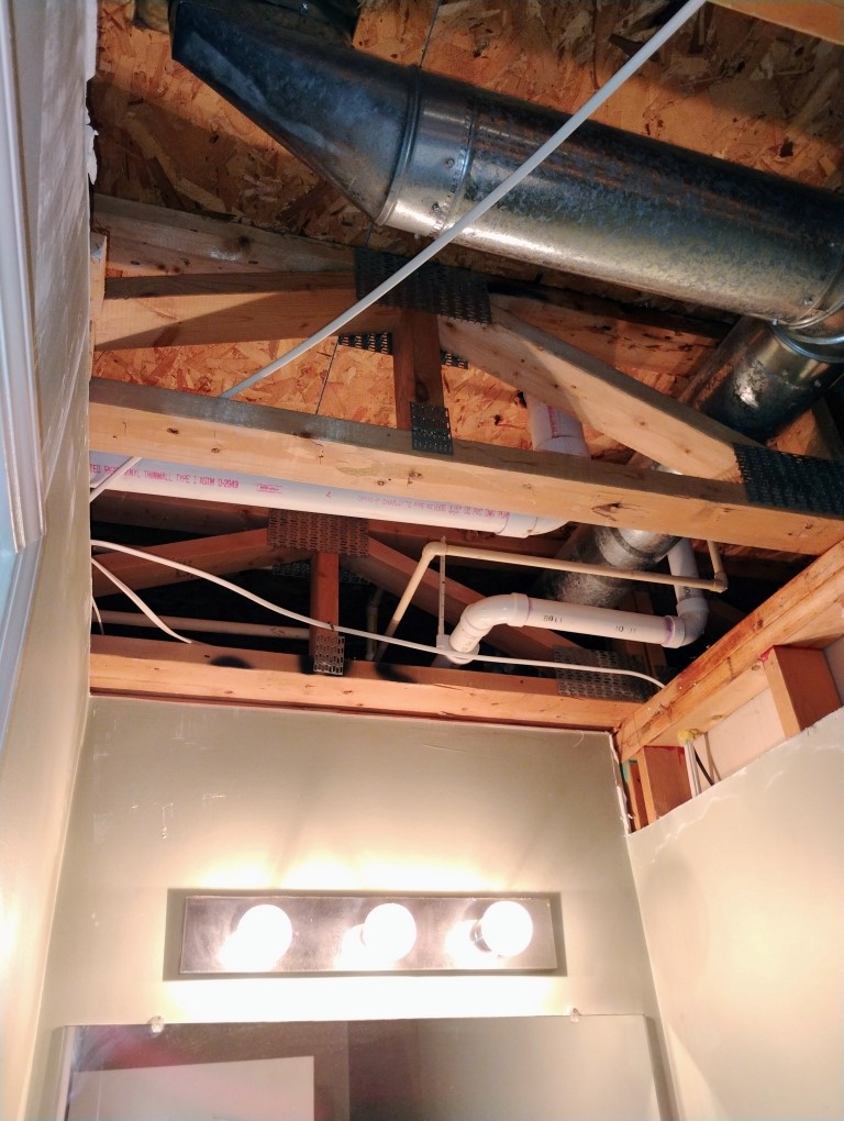 Water damage cleanup in a bathroom in Ypsilanti MI